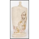 An early 20th century Japanese bone perfume bottle / tear catcher with depiction of elders. Measures