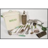 A collection of vintage 20th Century kitchenalia items to include an enamel bread bin and lid with