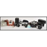A collection of vintage 20th Century 35mm camera's and lenses to include Practika amongst others,