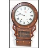 A 19th century Victorian mahogany station wall clock having boxwood inlay with later dial.Roman