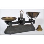 A pair of of vintage early 20th century local interest shop scales, from Parnall & Sons Bristol,