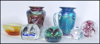 A collection of studio glass items to include a Studio glass vase by Okra, marbling effect to a blue
