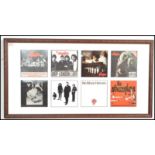 A group of four vinyl 45rpm 7" singles by The Stranglers, the singles framed, glazed and mounted