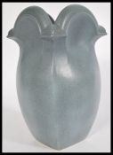 A stunning Gothic revival studio pottery vase of b