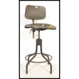 An early 20th century Industrial machinists - factory chair stool having  vinyl seat and back rest