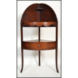 A George III solid mahogany corner washstand - whatnot etargere. Raised on shaped legs with single