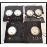 A group of three vintage Industrial 20th Century industrial volt meter reading dials, each board