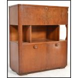 A 1930's Art Deco walnut recordl / drinks cabinet by Broadway ' Record Magazine  ' Cabinet. The