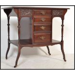 An Edwardian mahogany Art Nouveau writing table / desk. Raised on angled feet with tapering and