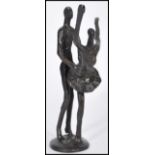 A 20th century bronze figurine group depicting a ballerina and partner mid dance raised on