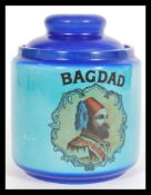 A vintage 20th century blue tobacco jar reading Ba