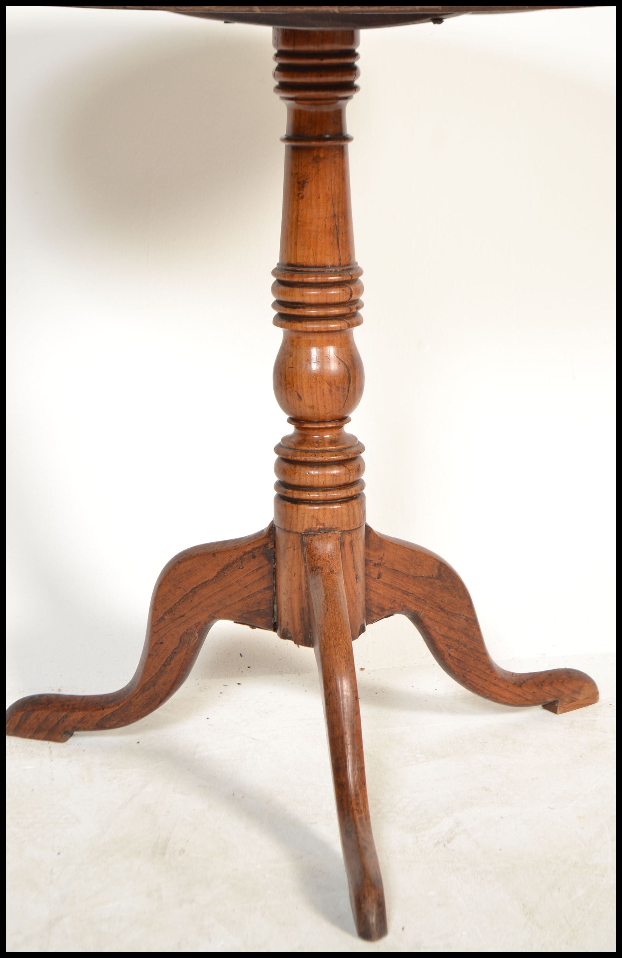 A 19th century mahogany tilt top wine / occasional table being raised on splayed legs, turned column - Image 3 of 4