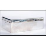 A very large silver hallmarked cigarette / tobacco / cigar humidor box by Walker and Hall. The