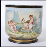 A 19th Century Jardiniere / garden pot having a hand painted classical garden scene with playful