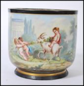 A 19th Century Jardiniere / garden pot having a hand painted classical garden scene with playful