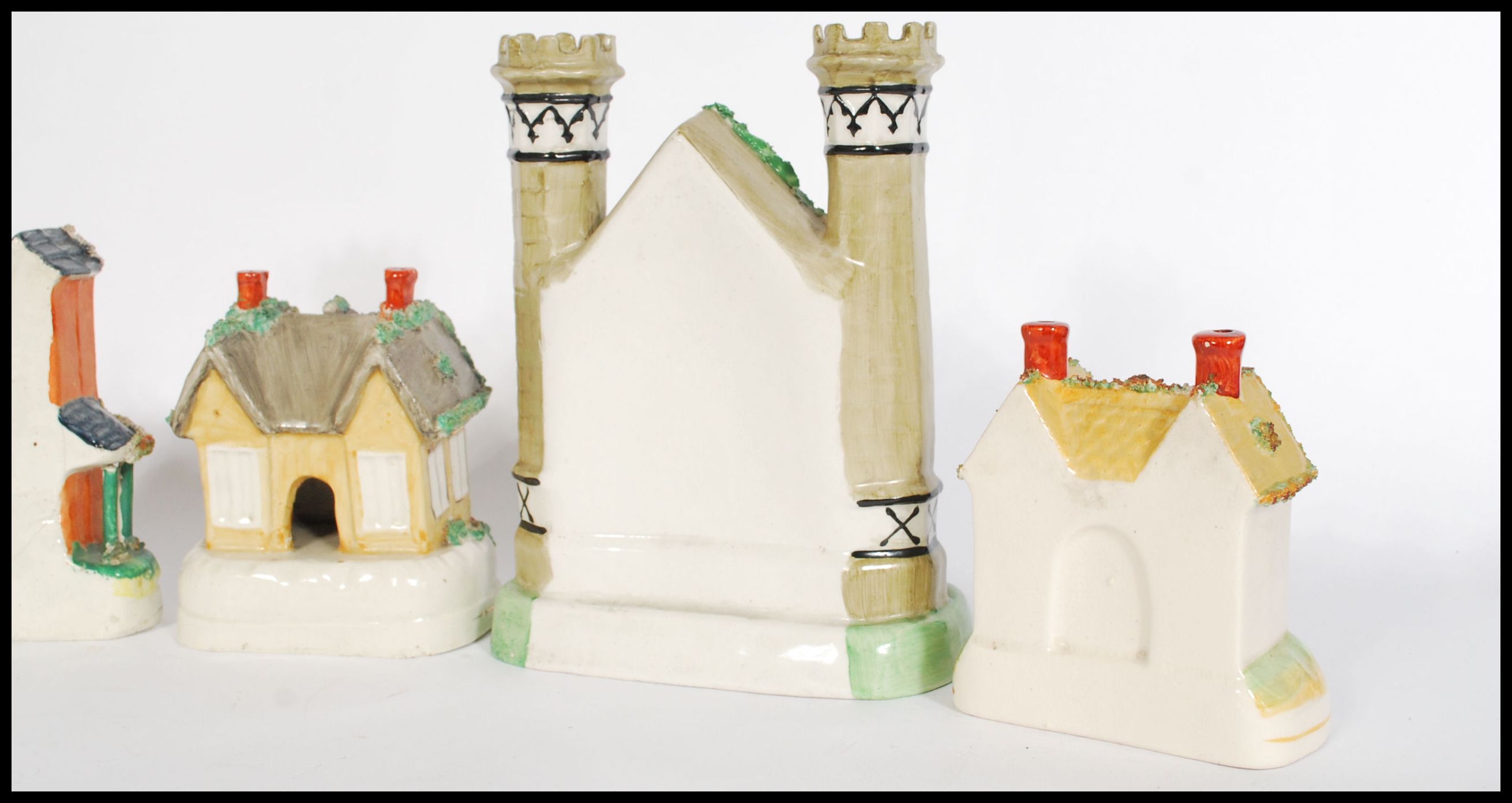 A selection of Staffordshire cottage’s dating from the 19th century to include some money box - Image 5 of 7