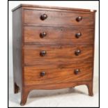 A Victorian 19th century mahogany straight front chest of drawers being raised on kick legs with a