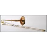 A 20th Century cased Frank Holton & Co Collegiate brass and plated trombone, engraved Holton Elkhorn