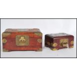 Two vintage 20th century Chinese boxes having carved jade panels to lids.  Both with brass locks and