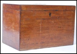 A 19th Century Georgian wooden campaign box, having a inlaid brass swing handle to the top, and