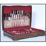 A vintage early 29th century oak cased canteen of silver plated cutlery by Alpin of Sheffield