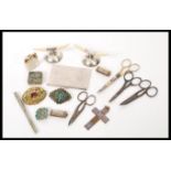 A mixed lot of vintage items to include silver plated cigarette case, ivory date holders,