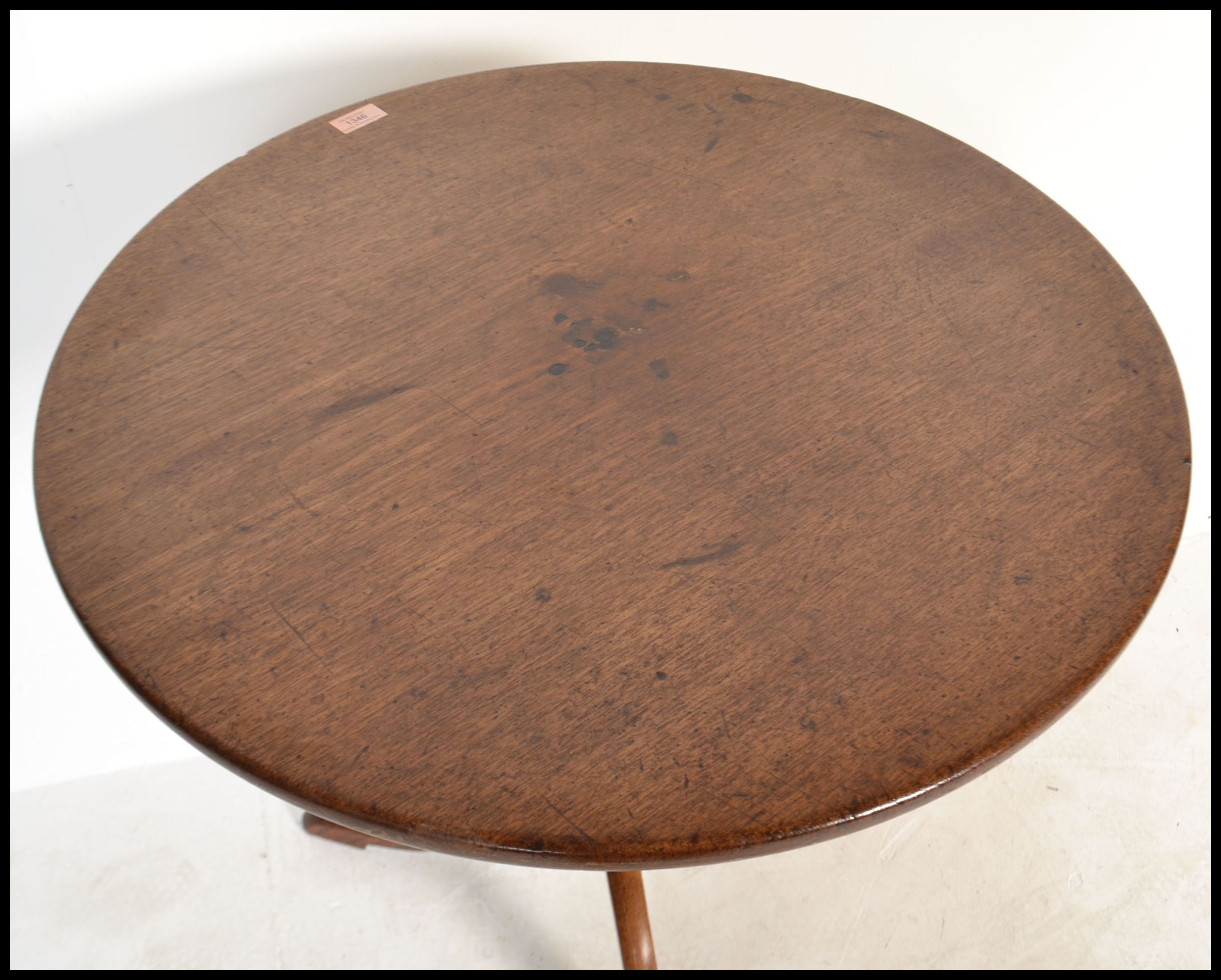 A 19th century mahogany tilt top wine / occasional table being raised on splayed legs, turned column - Image 4 of 4