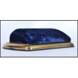 A vintage early 20th century Watch case /  box with blue velvet lining in a gold-tone metal