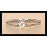 A 14ct white gold 585 stamped solitaire diamond ring having a central diamond in claw setting with