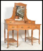 A late Victorian ash / oak six leg dressing table. Raised on ring turned legs with a series of