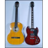 Two vintage retro 20th century guitars to include an Encore Spanish acoustic example and an Epiphone