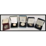 A selection of proof coins in presentation boxes t