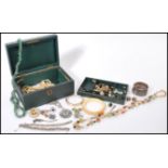 A selection of vintage costume jewellery to include two art deco style marcasite bracelets, two