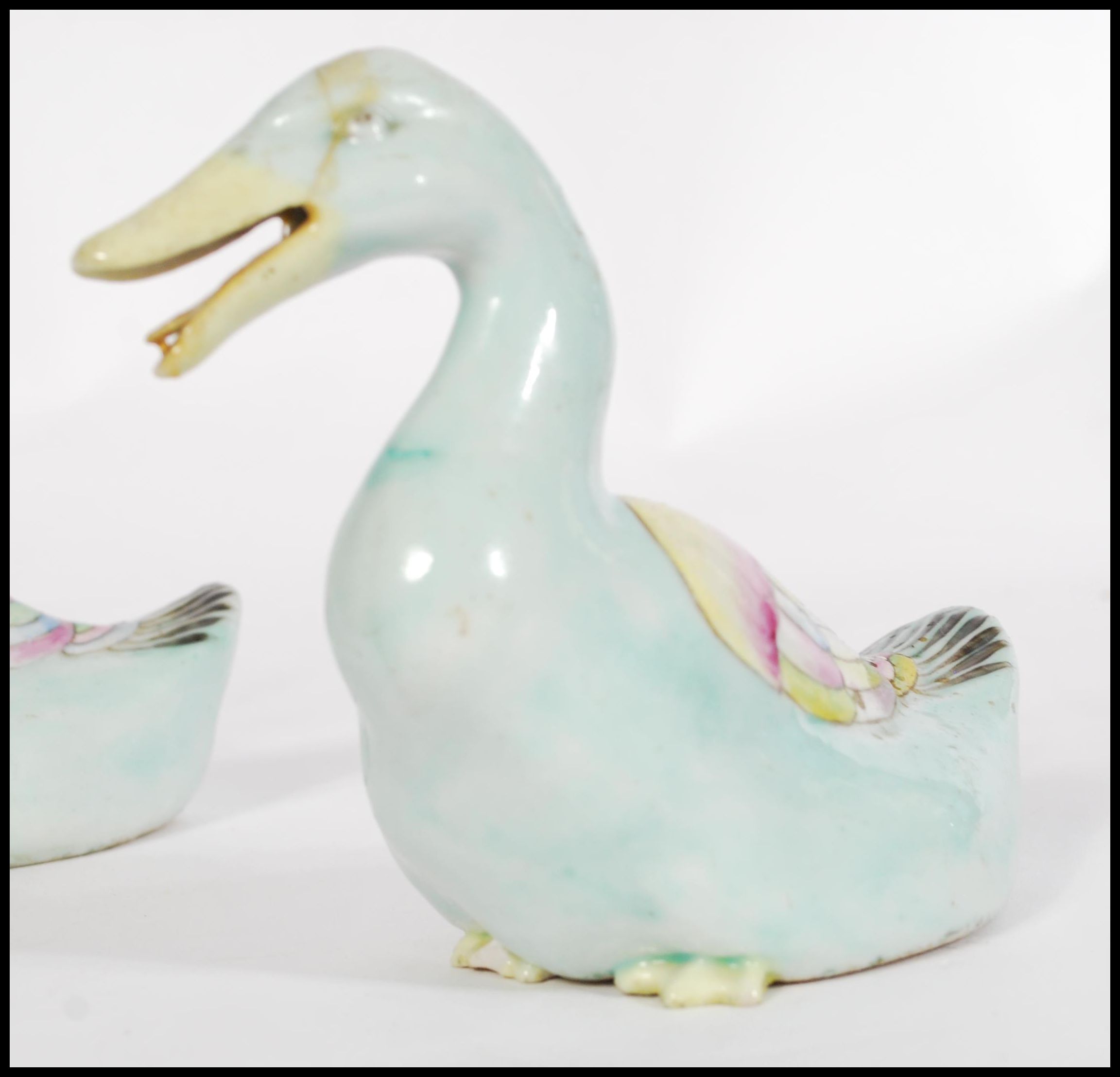 A pair of 19th century Chinese Ming style pottery ducks, each polychrome decorated predominantly - Image 2 of 4