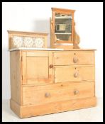 A Victorian pine and marble scholars - dressing table chest of drawers. Raised on a plinth base with