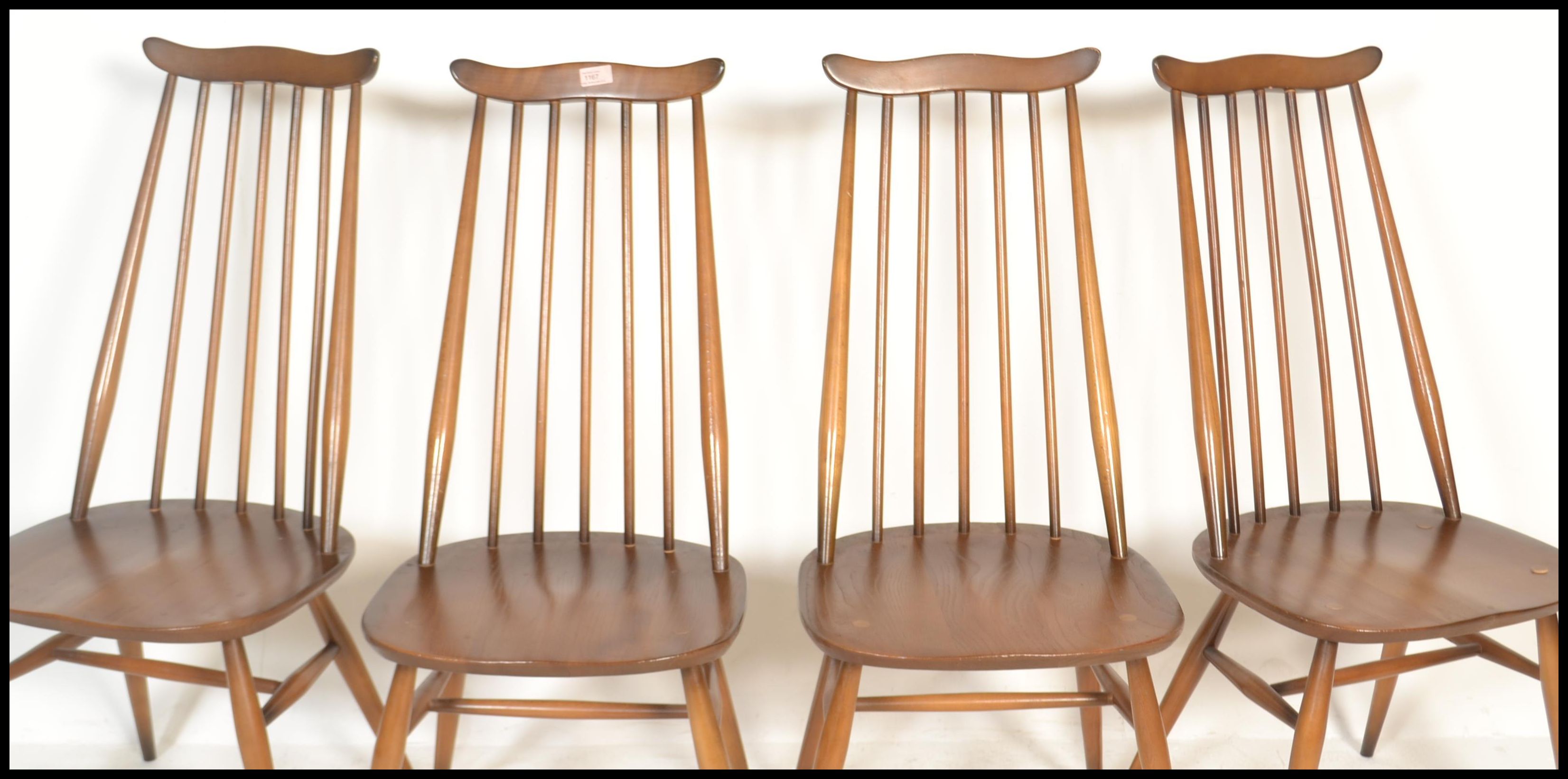 A set of four 20th century vintage Golden Dawn Ercol beech and elm stick back dining chairs, - Image 2 of 3