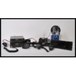 A group of vintage CB radios to include a Uniden PC404 , a pair of CB radios, headphones and