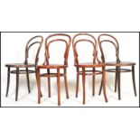 A set of four vintage early 20th century Thonet style bentwood cafe / bistro dining chairs, circular