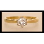 A hallmarked 18ct gold diamond solitaire ring having a central brilliant cut stone of approx