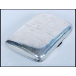 An early 20th century silver hallmarked cigarette case of curved rectangular form. Hallmarked for