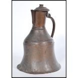 An 19th century middle eastern Persian Islamic brass and copper coffee pot Dallah, probably Turkish.