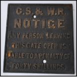 A vintage retro cast iron railway sign for Great Southern & Western Railway reading 'Notice any