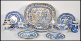 A collection of blue and white ceramics dating from the 18th Century to include three lidded tureens