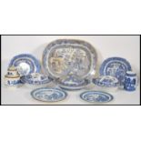 A collection of blue and white ceramics dating from the 18th Century to include three lidded tureens