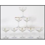 A set of eight vintage / retro 20th century point of  sale advertising glasses for Babycham, the