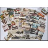 A good collection of vintage postcards dating from the early 20th Century to include Military,