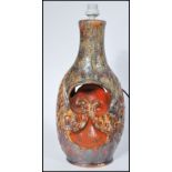 A large 20th century Cornish studio pottery lamp of Fat Lava inspiration. Of bottle baluster form