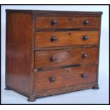 A 19th century apprentice piece / specimen cabinet chest of drawers. Raised on bun feet with a