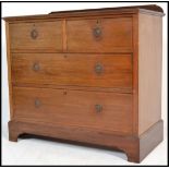 An early 20th Century Edwardian mahogany two over two chest of drawers, raised on bracket feet.