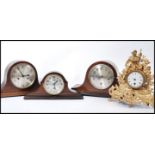A group of 20th century mantel clocks to include a Westminster Chimes clock with Arabic numerals
